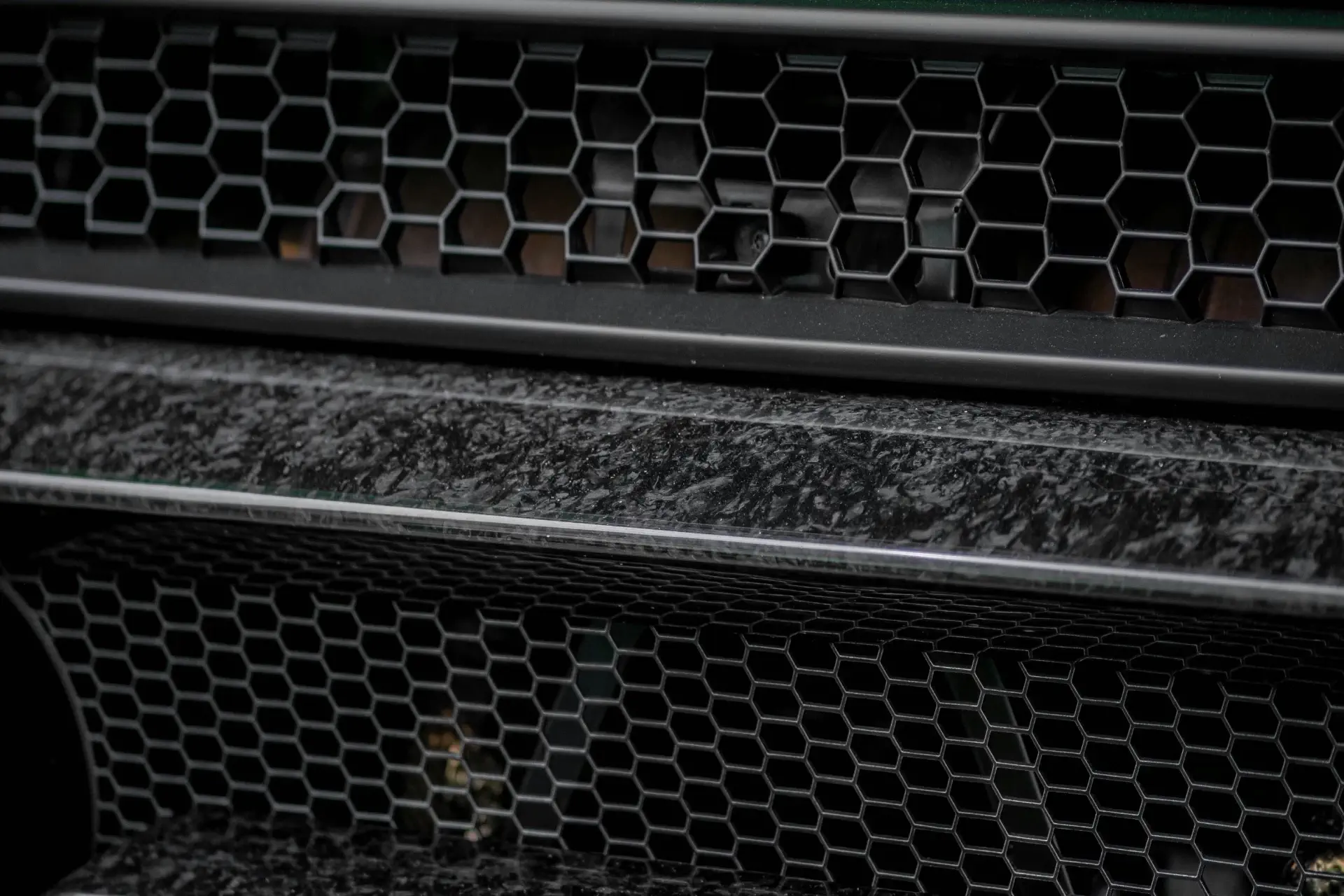 Buonauto Enterprises footer image featuring exotic and classic car dealership details