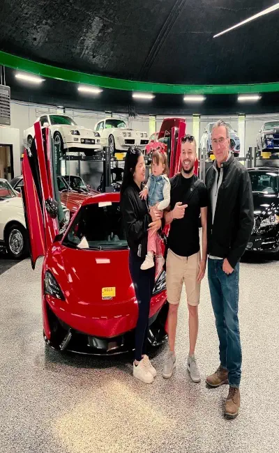 Exotic vehicle handoff day at Buonauto Enterprises exotic car dealership