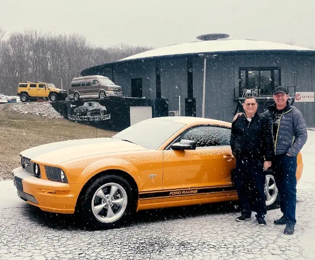 Customer delivery photo with classic vehicle at Buonauto Enterprises