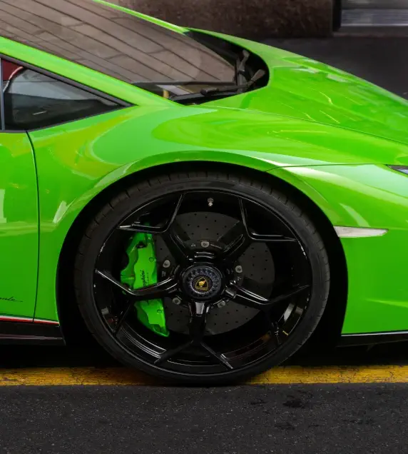 Classic green Lamborghini representing Buonauto Enterprises 80-year automotive heritage